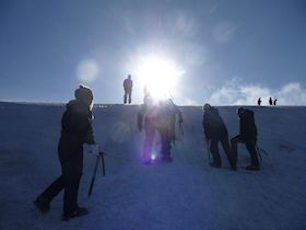 Winter Skills course in the Cairngorms learning to use ice axe and crampons.